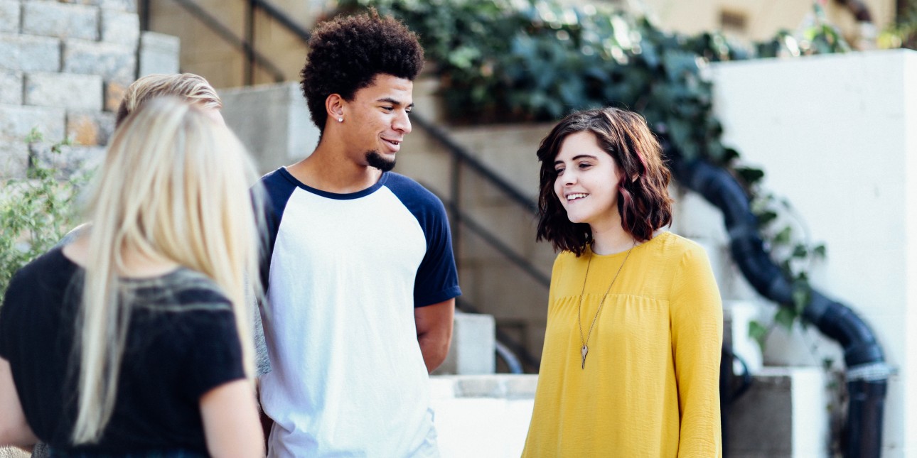 Youth standing and talking