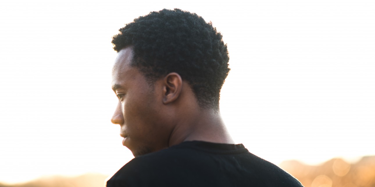 man facing away
