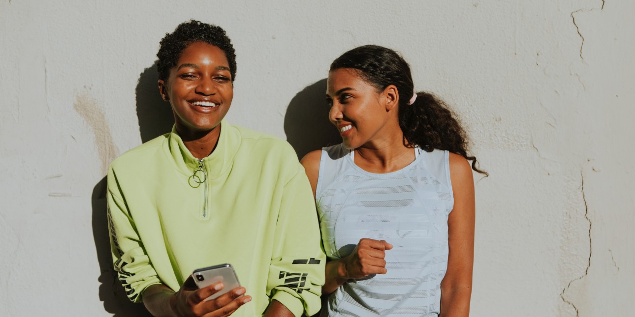 Two women laughing together