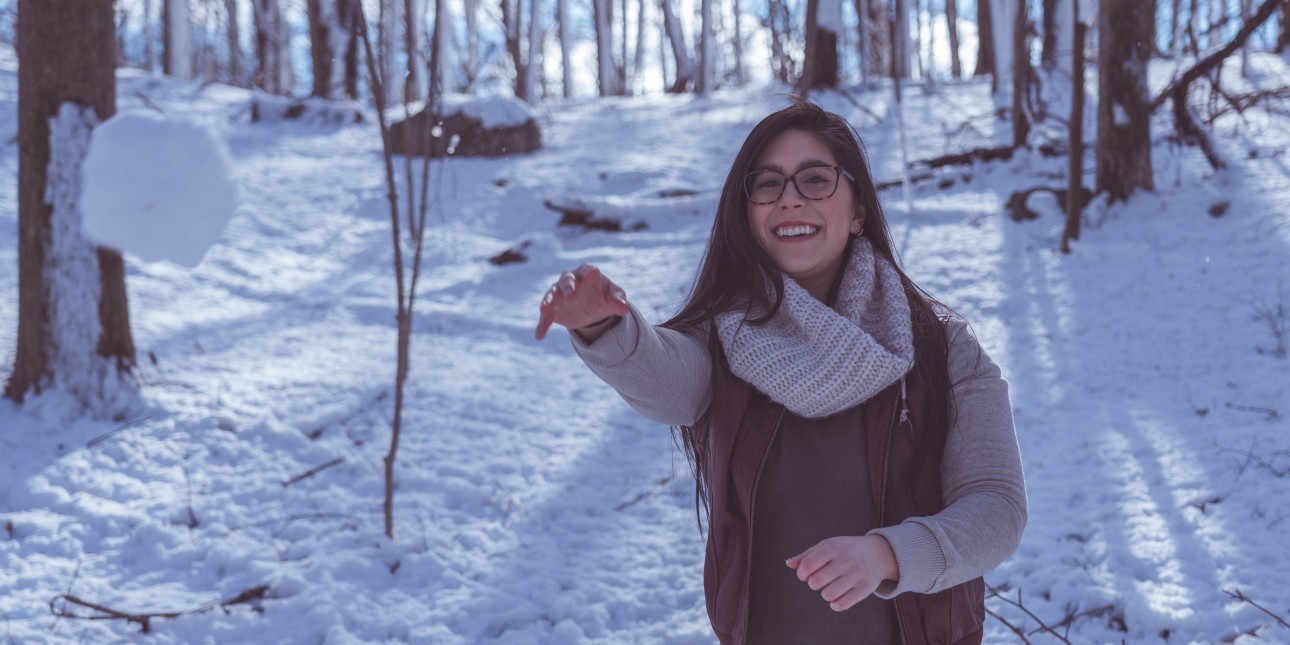 Person throwing snowball