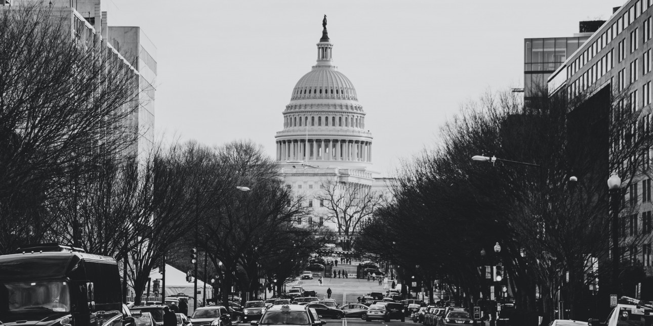 street view of U.S. capitol with cars