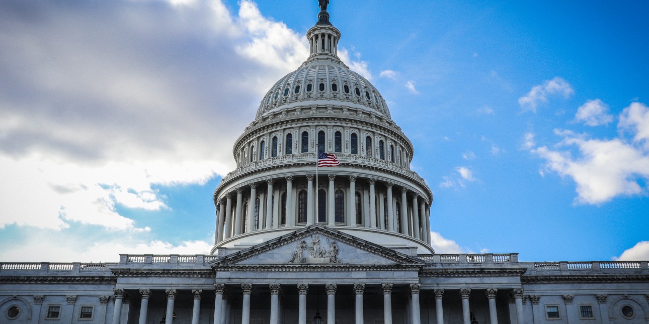 US Capitol with a blue sky and clouds