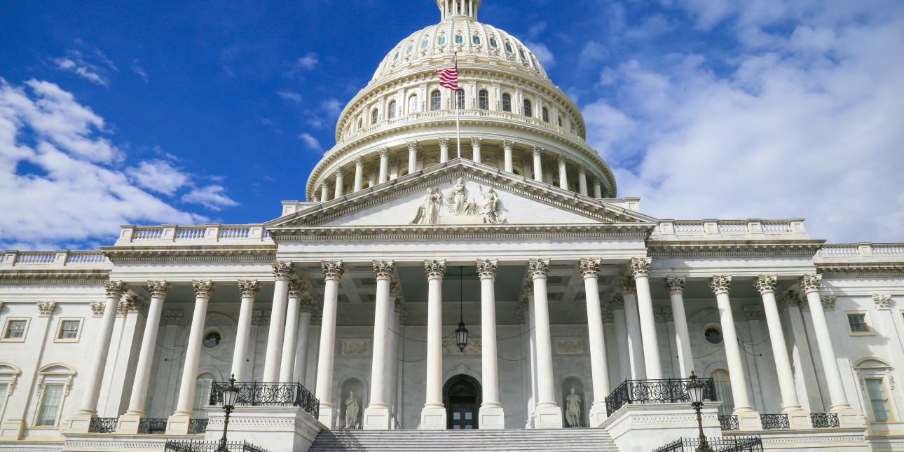 US Capitol with a blue sky and clouds