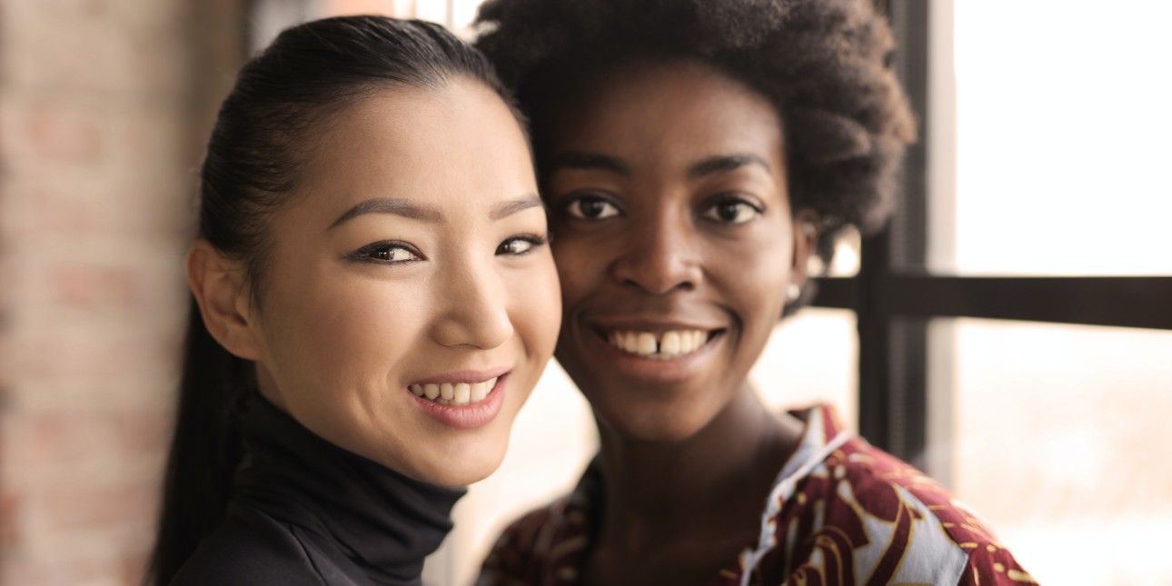 two people standing together