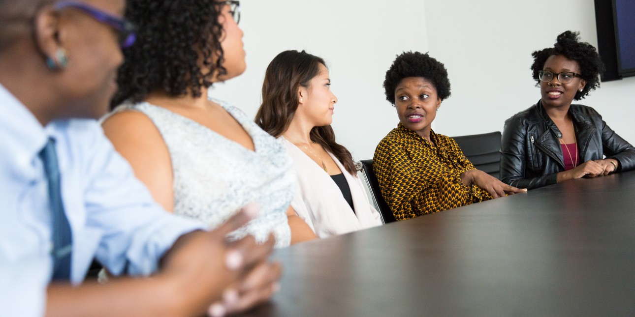 People talking at a table