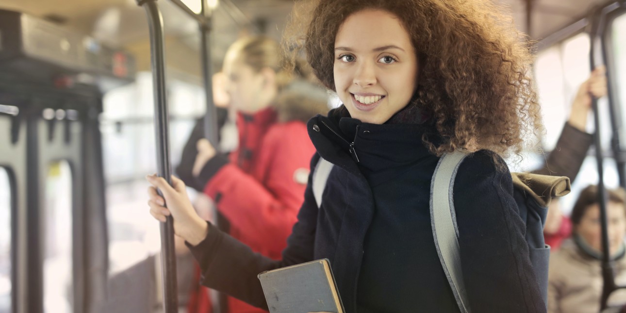 Woman in Black Coat Riding Subway