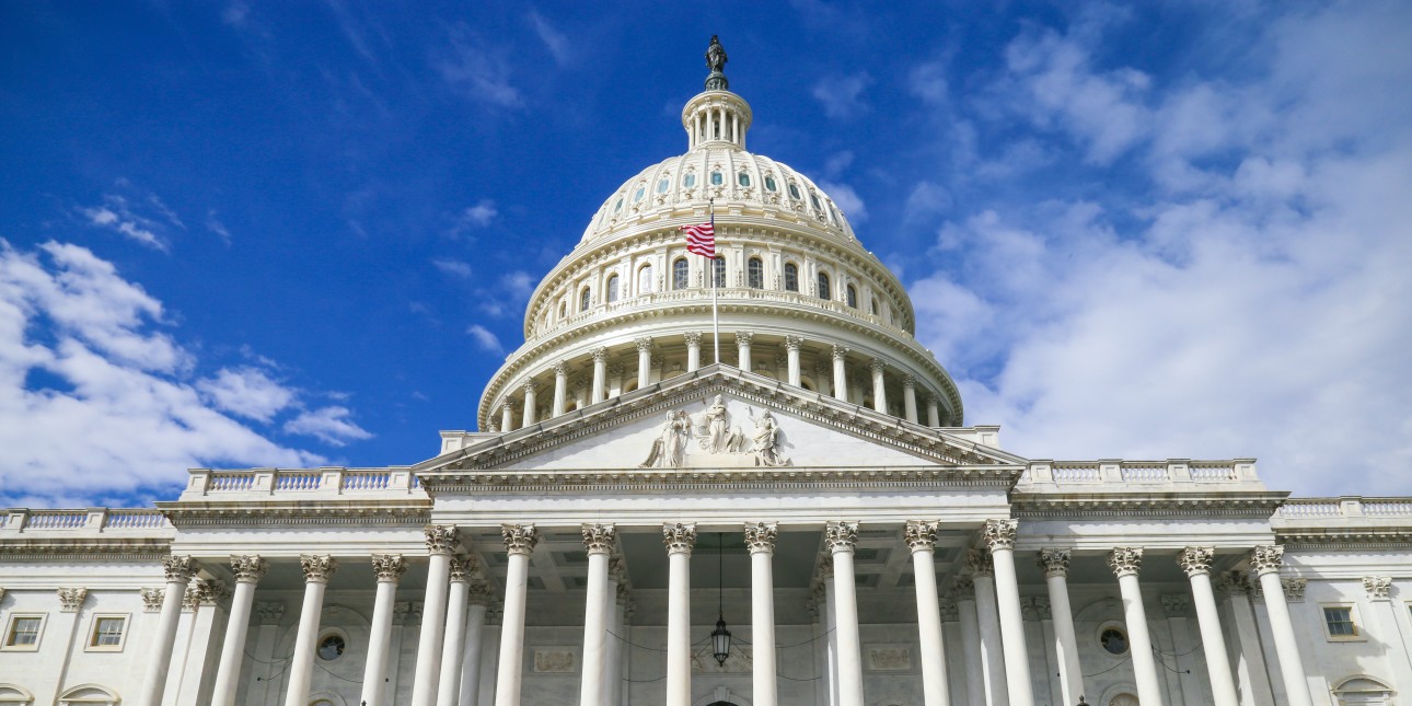 US Capitol with a blue sky and clouds