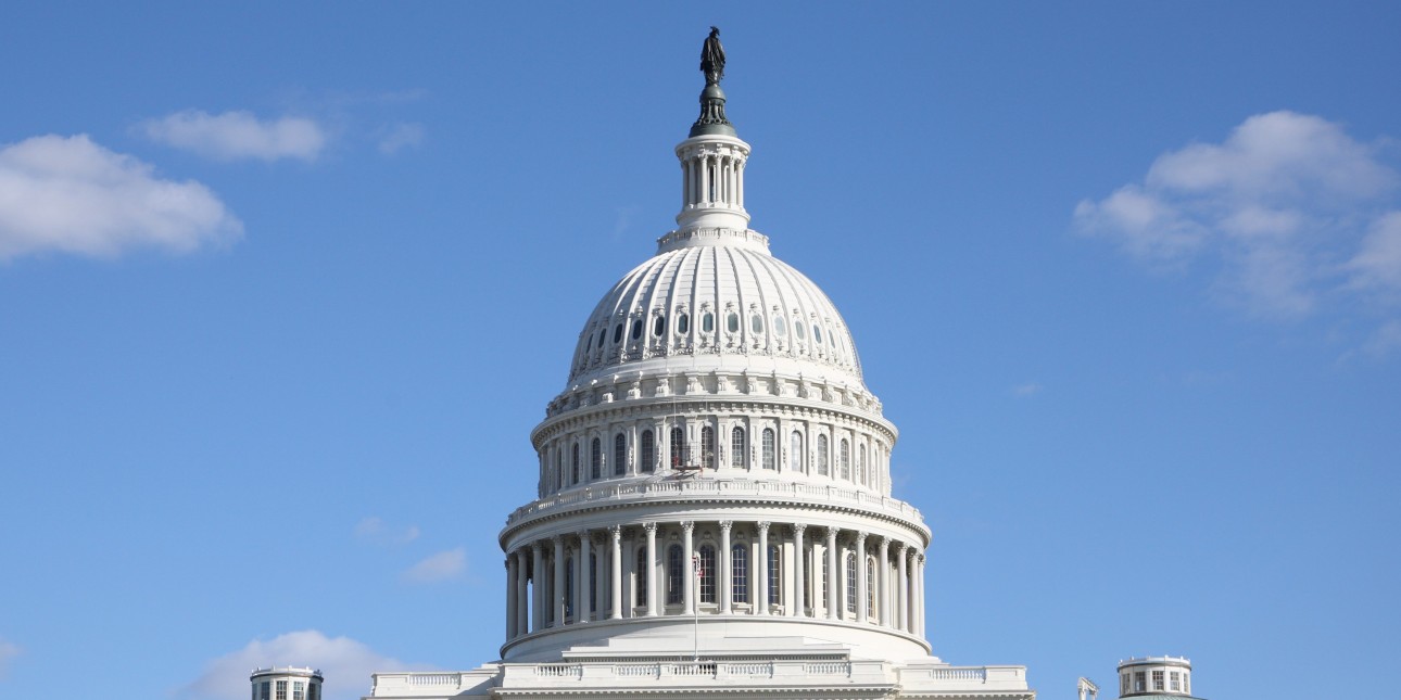 US Capitol with a blue sky and clouds