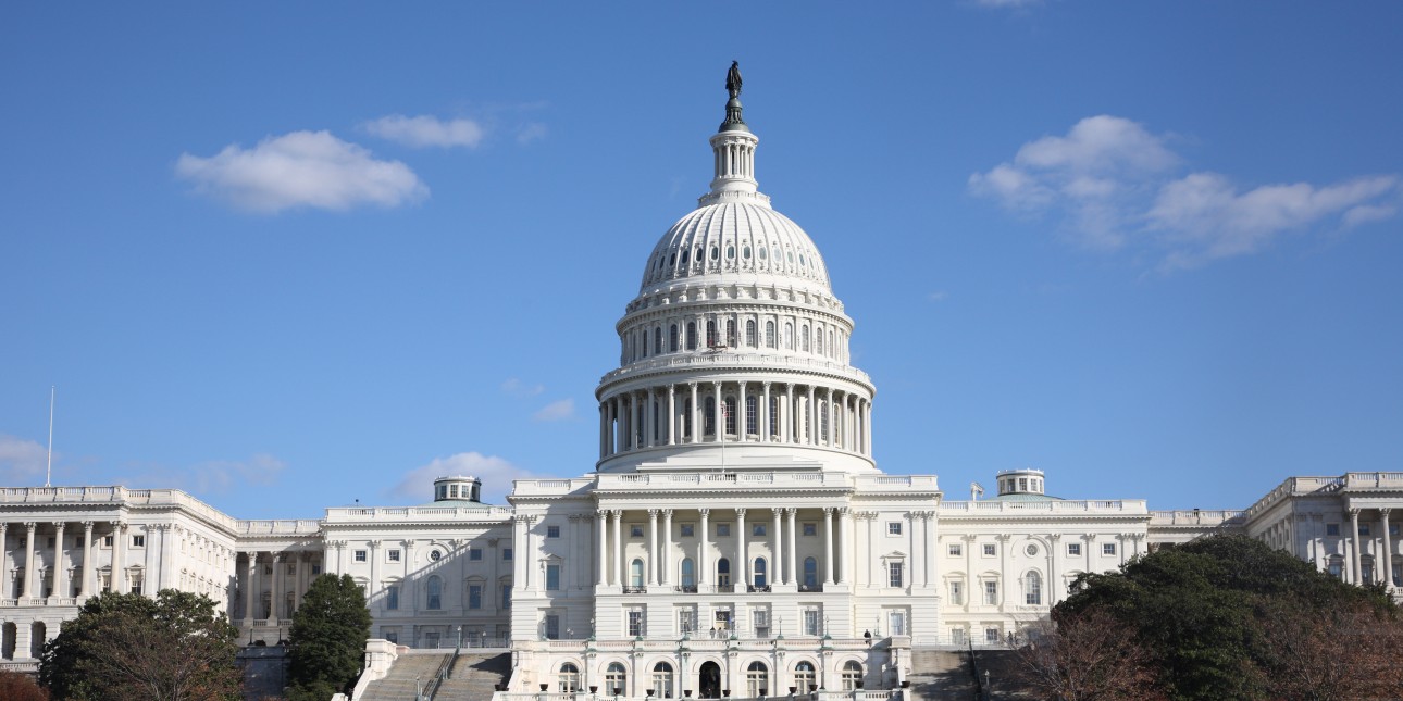 US Capitol with a blue sky and clouds