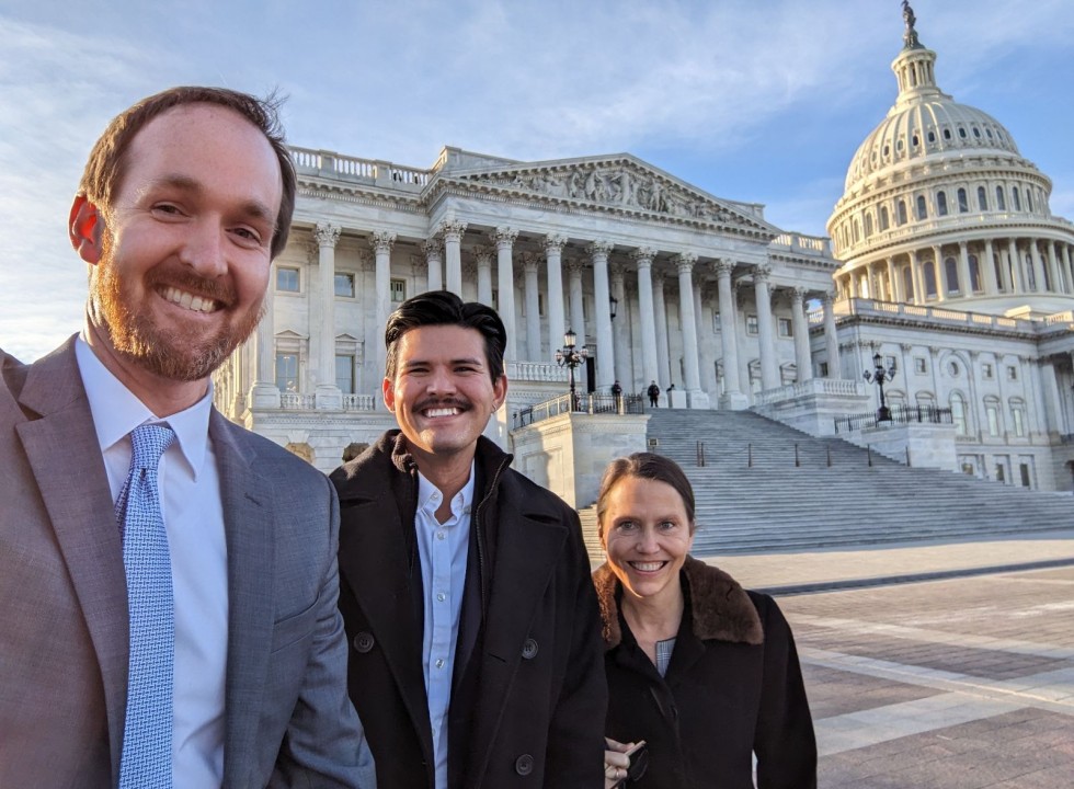 three youth collab team members outside the US Capitol