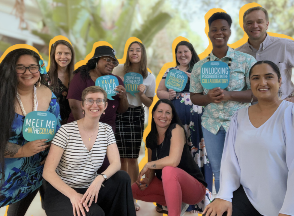 A group of smiling Youth Collaboratory Staff from the Youth Housing Justice Team