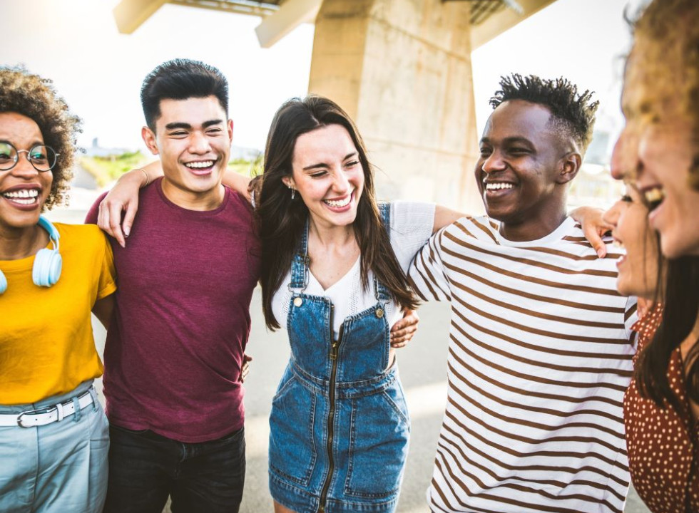 Young people embracing and smiling