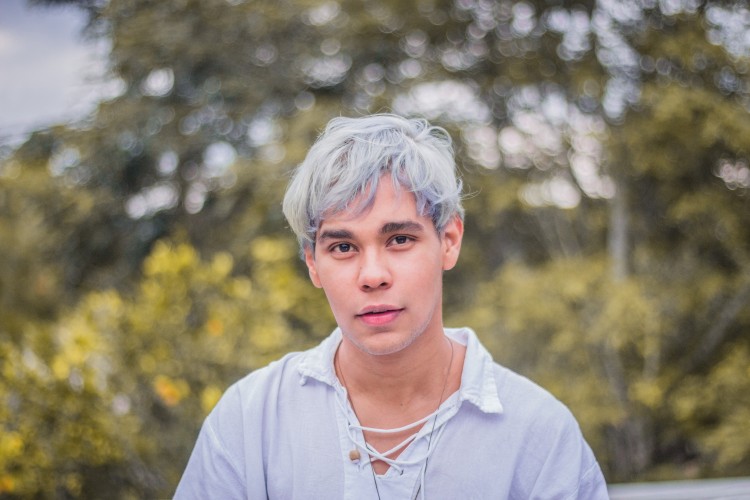 Young man with white hair