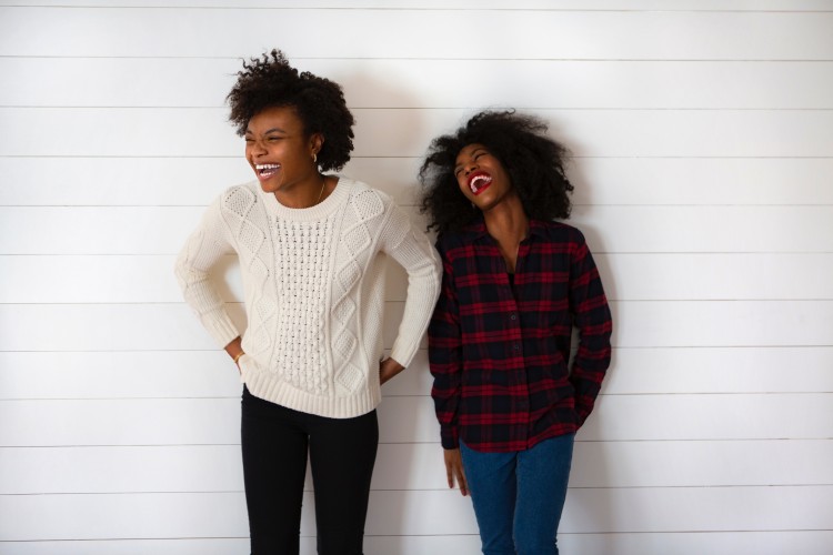 two women laughing