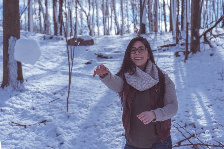 Person throwing snowball