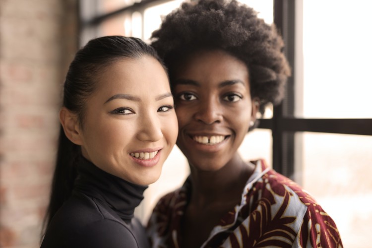 two people standing together