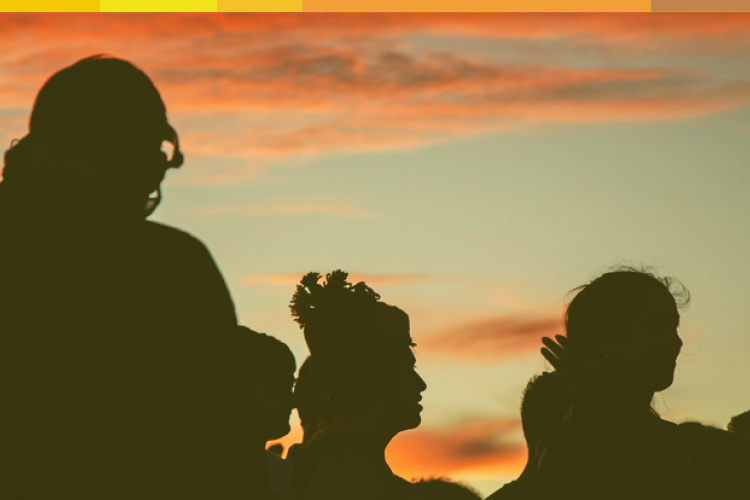 Group of young people at sunset